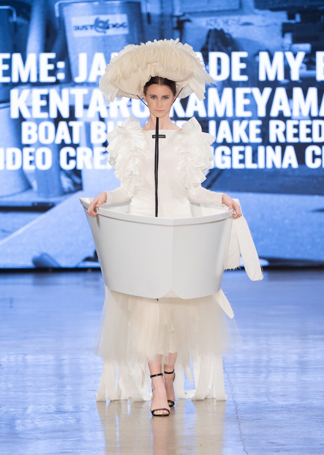 LOS ANGELES, CALIFORNIA - OCTOBER 17: A model walks the runway at the Kentaro Kameyama show during Los Angeles Fashion Week Powered By Art Hearts Fashion at The New Mart on October 17, 2025 in Los Angeles, California. (Photo by Mark Gunter/Getty Images for Art Hearts Fashion)