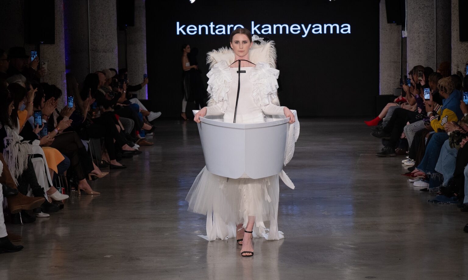 LOS ANGELES, CALIFORNIA - OCTOBER 17: A model walks the runway at the Kentaro Kameyama show during Los Angeles Fashion Week Powered By Art Hearts Fashion at The New Mart on October 17, 2025 in Los Angeles, California. (Photo by Mark Gunter/Getty Images for Art Hearts Fashion)