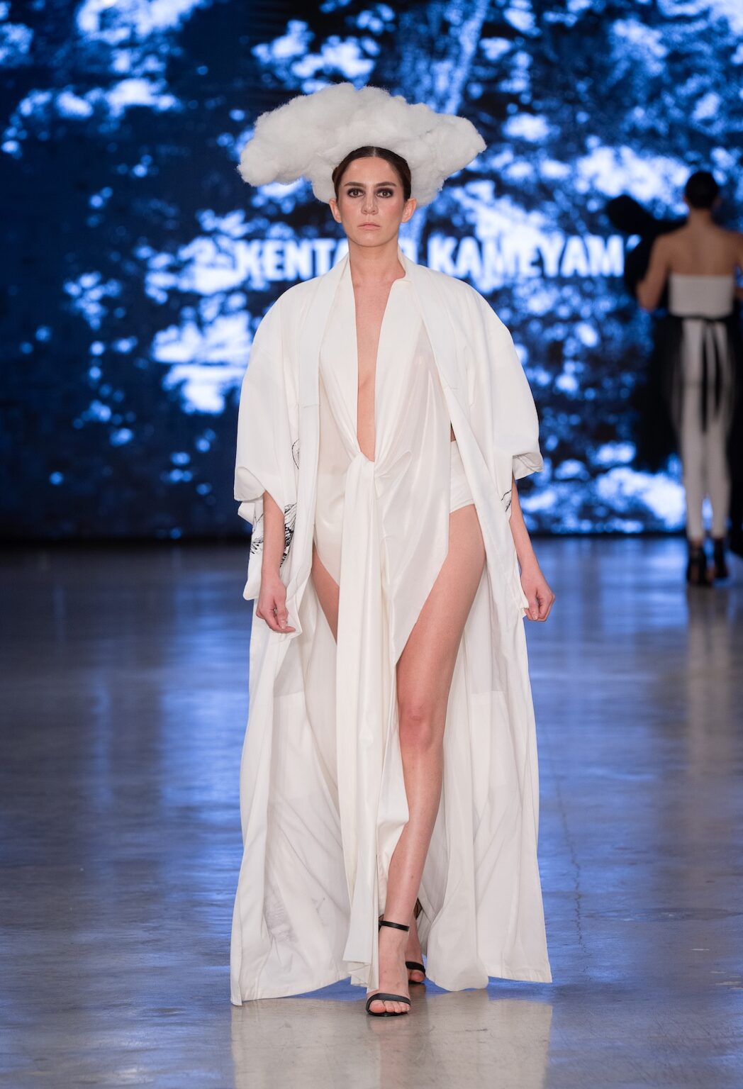 LOS ANGELES, CALIFORNIA - OCTOBER 17: A model walks the runway at the Kentaro Kameyama show during Los Angeles Fashion Week Powered By Art Hearts Fashion at The New Mart on October 17, 2025 in Los Angeles, California. (Photo by Mark Gunter/Getty Images for Art Hearts Fashion)