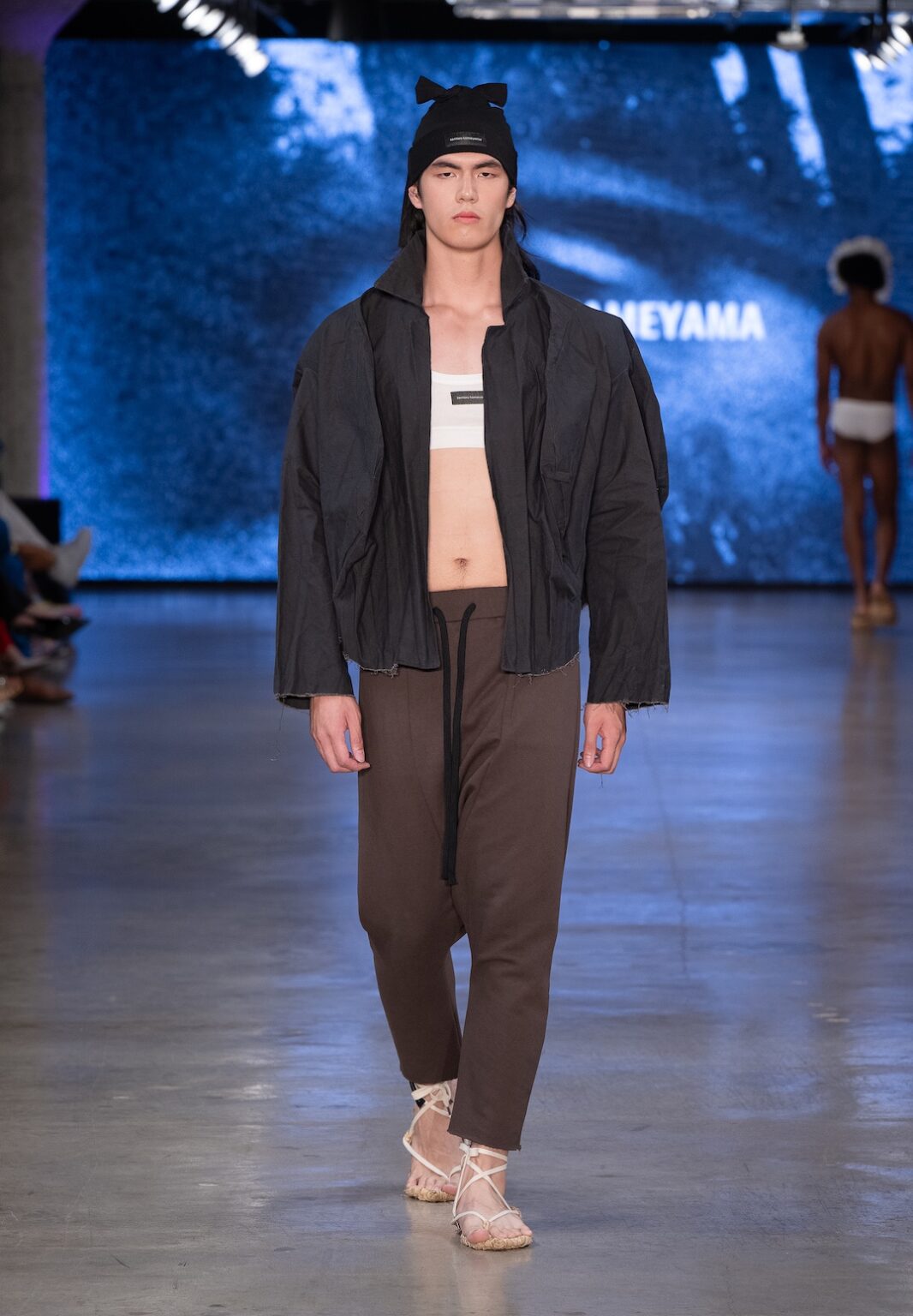 LOS ANGELES, CALIFORNIA - OCTOBER 17: A model walks the runway at the Kentaro Kameyama show during Los Angeles Fashion Week Powered By Art Hearts Fashion at The New Mart on October 17, 2025 in Los Angeles, California. (Photo by Mark Gunter/Getty Images for Art Hearts Fashion)
