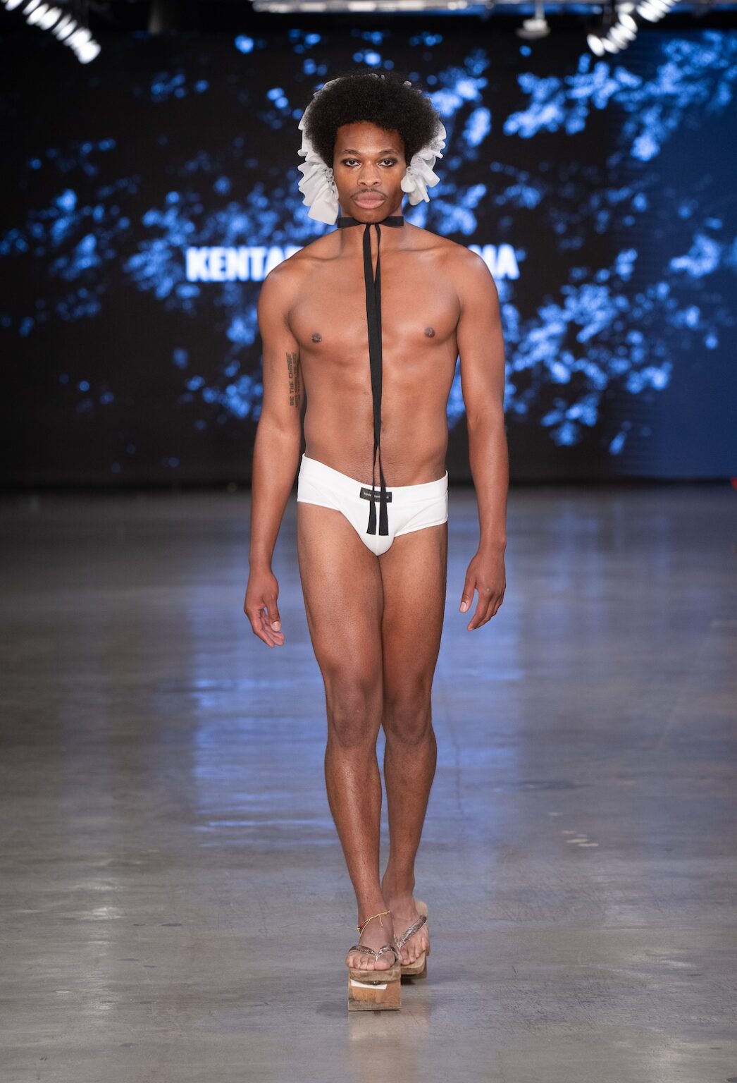 LOS ANGELES, CALIFORNIA - OCTOBER 17: A model walks the runway at the Kentaro Kameyama show during Los Angeles Fashion Week Powered By Art Hearts Fashion at The New Mart on October 17, 2025 in Los Angeles, California. (Photo by Mark Gunter/Getty Images for Art Hearts Fashion)