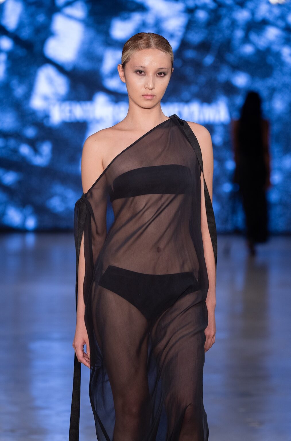 LOS ANGELES, CALIFORNIA - OCTOBER 17: A model walks the runway at the Kentaro Kameyama show during Los Angeles Fashion Week Powered By Art Hearts Fashion at The New Mart on October 17, 2025 in Los Angeles, California. (Photo by Mark Gunter/Getty Images for Art Hearts Fashion)