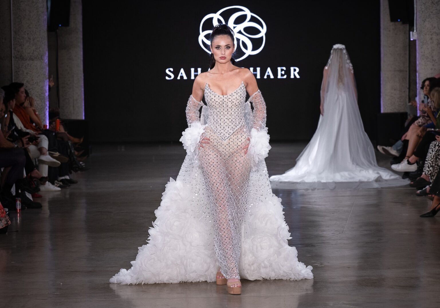 LOS ANGELES, CALIFORNIA - OCTOBER 18: A model walks the runway at the Sahar Shaeir Couture show during Los Angeles Fashion Week Powered By Art Hearts Fashion at The New Mart on October 18, 2025 in Los Angeles, California. (Photo by Mark Gunter/Getty Images for Art Hearts Fashion)