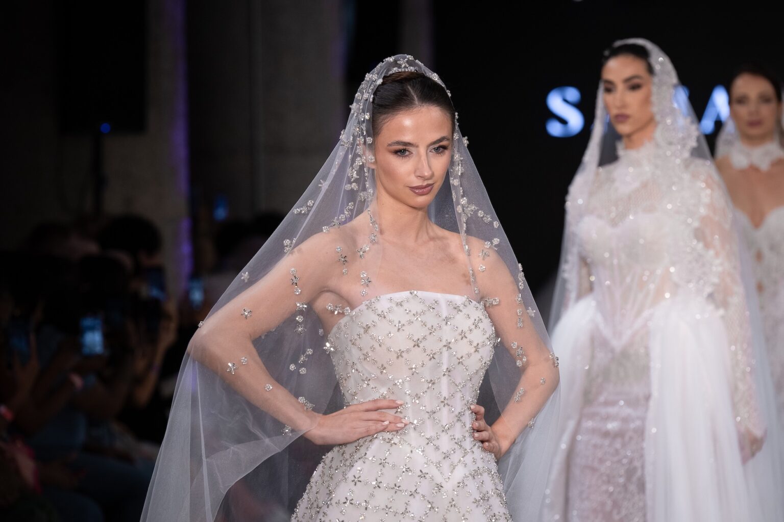 LOS ANGELES, CALIFORNIA - OCTOBER 18: A model walks the runway at the Sahar Shaeir Couture show during Los Angeles Fashion Week Powered By Art Hearts Fashion at The New Mart on October 18, 2025 in Los Angeles, California. (Photo by Mark Gunter/Getty Images for Art Hearts Fashion)