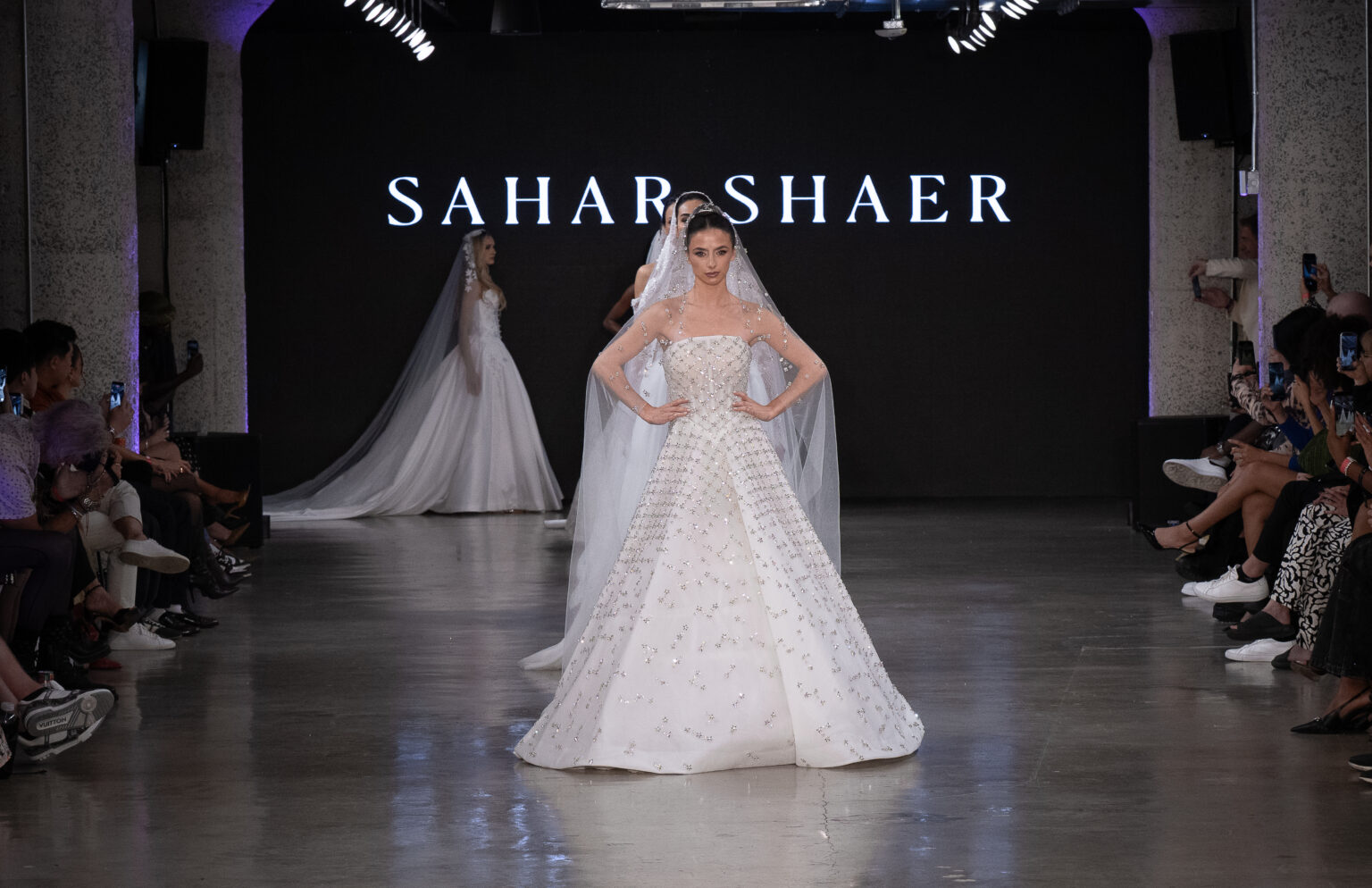 LOS ANGELES, CALIFORNIA - OCTOBER 18: A model walks the runway at the Sahar Shaeir Couture show during Los Angeles Fashion Week Powered By Art Hearts Fashion at The New Mart on October 18, 2025 in Los Angeles, California. (Photo by Mark Gunter/Getty Images for Art Hearts Fashion)
