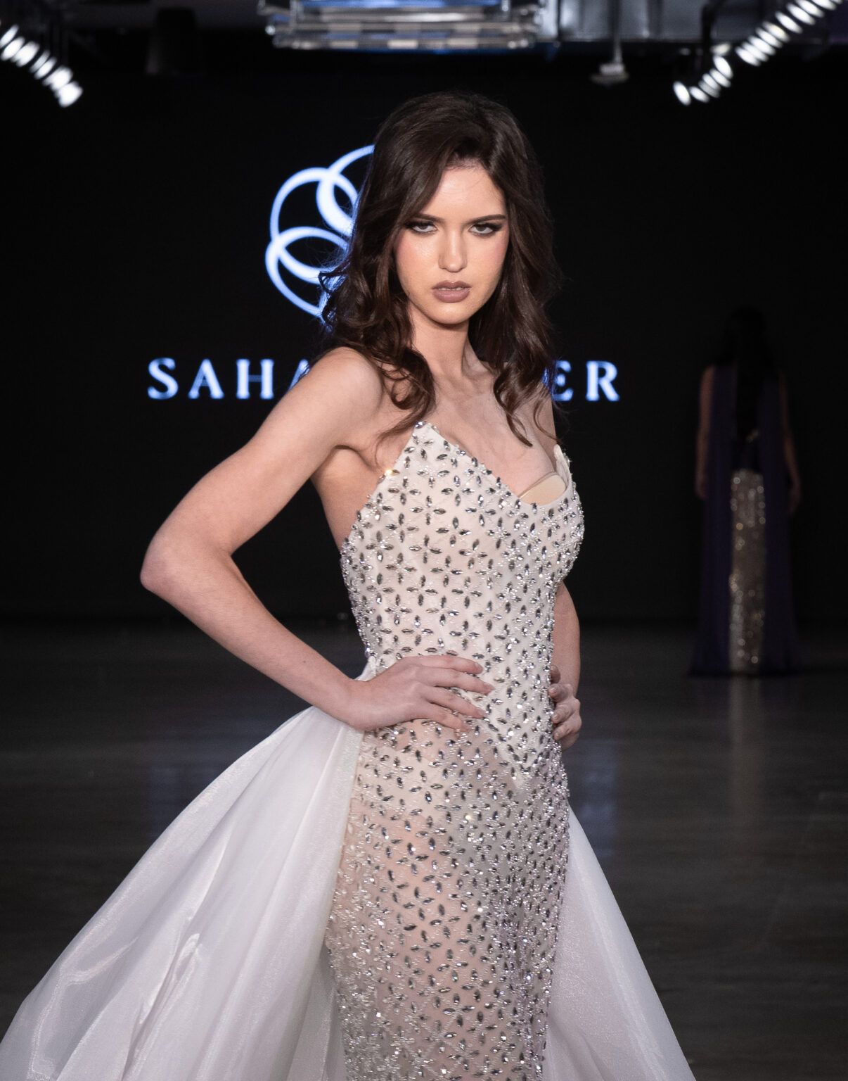 LOS ANGELES, CALIFORNIA - OCTOBER 18: A model walks the runway at the Sahar Shaeir Couture show during Los Angeles Fashion Week Powered By Art Hearts Fashion at The New Mart on October 18, 2025 in Los Angeles, California. (Photo by Mark Gunter/Getty Images for Art Hearts Fashion)