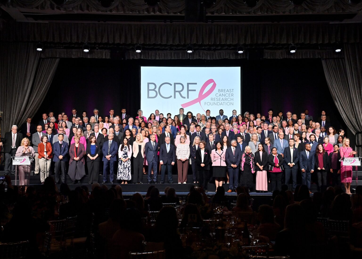 NEW YORK, NEW YORK - OCTOBER 30: Breast Cancer Research Foundation Researchers pose onstage at the Breast Cancer Research Foundation New York Symposium & Awards Luncheon at New York Hilton Midtown on October 30, 2025 in New York City. (Photo by Bryan Bedder/Getty Images for Breast Cancer Research Foundation)