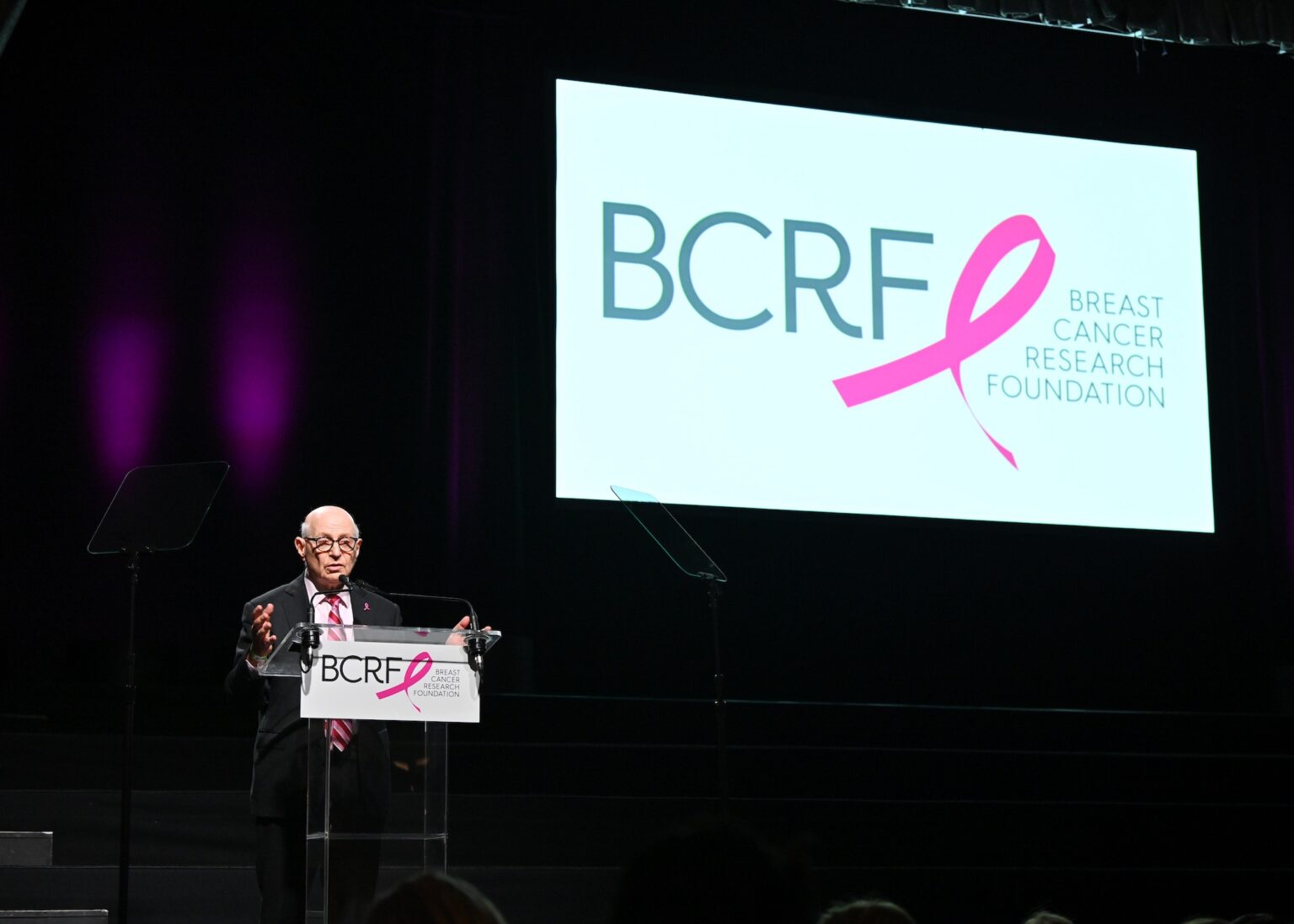 NEW YORK, NEW YORK - OCTOBER 30: Dr. Larry Norton speaks onstage at the Breast Cancer Research Foundation New York Symposium & Awards Luncheon at New York Hilton Midtown on October 30, 2025 in New York City. (Photo by Bryan Bedder/Getty Images for Breast Cancer Research Foundation)