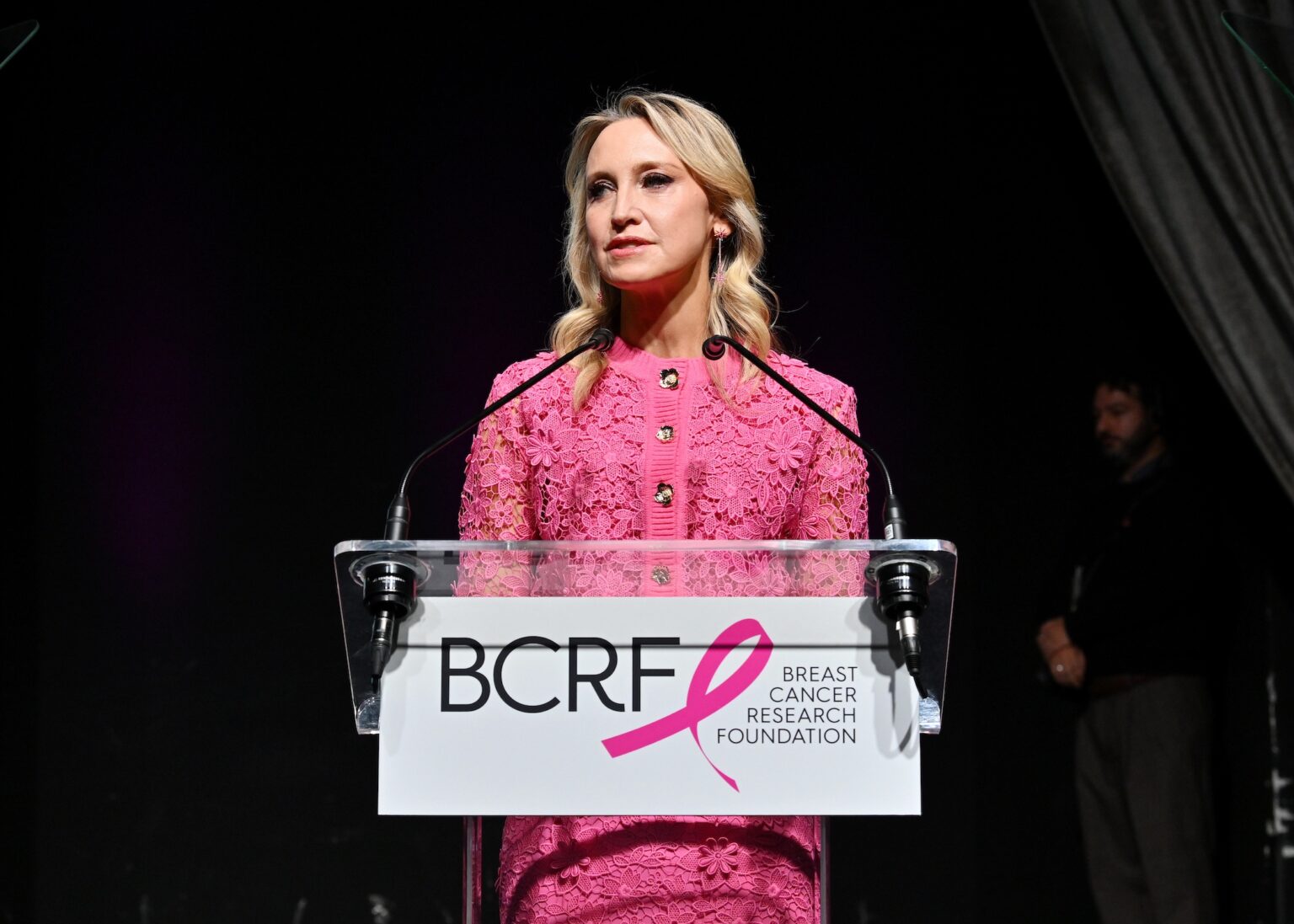 NEW YORK, NEW YORK - OCTOBER 30: Kinga Lampert speaks onstage at the Breast Cancer Research Foundation New York Symposium & Awards Luncheon at New York Hilton Midtown on October 30, 2025 in New York City. (Photo by Bryan Bedder/Getty Images for Breast Cancer Research Foundation)