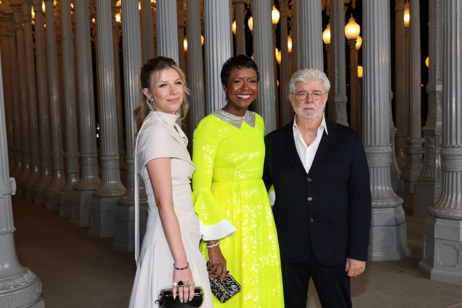 LOS ANGELES, CALIFORNIA - NOVEMBER 01: (L-R) Stephanie Bongiovi, LACMA Trustee Mellody Hobson, and LACMA Trustee George Lucas attend the 2025 LACMA Art+Film Gala, Presented By Gucci at Los Angeles County Museum of Art on November 01, 2025 in Los Angeles, California. (Photo by Amy Sussman/Getty Images for LACMA)