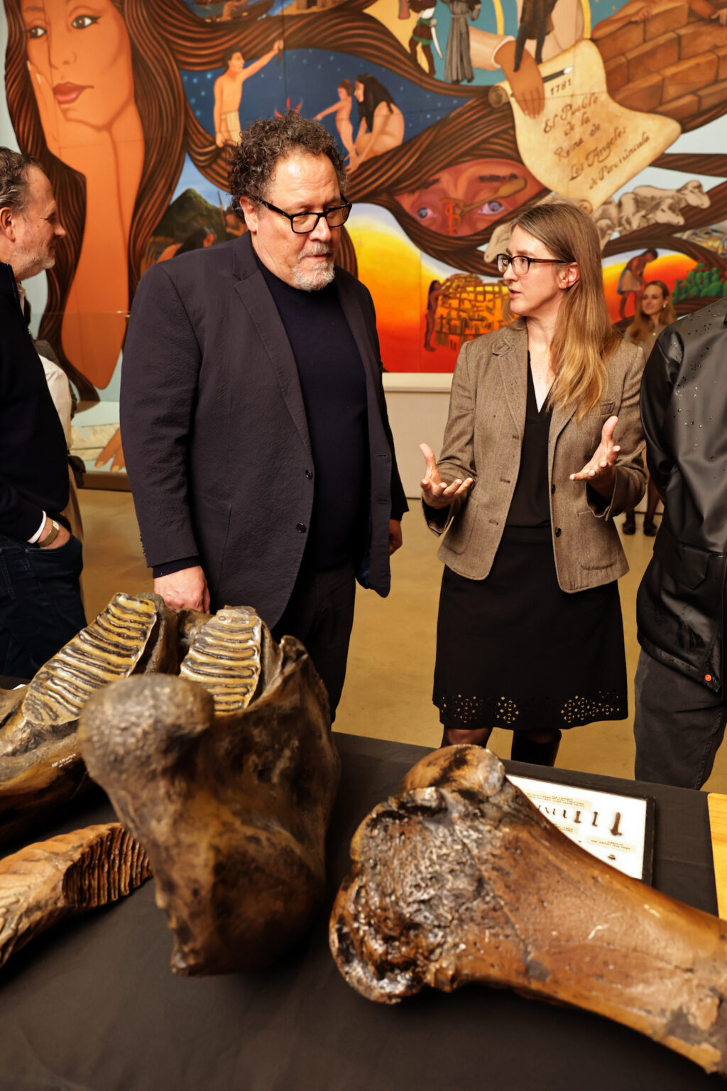 LOS ANGELES, CALIFORNIA - NOVEMBER 20: Jon Favreau and Dr. Emily Lindsey seen at a Special Screening And Behind The Scenes Conversation Of Apple TV's "Prehistoric Planet: Ice Age" at Natural History Museum Of Los Angeles County on November 20, 2025 in Los Angeles, California. (Photo by Eric Charbonneau/Apple TV via Getty Images)