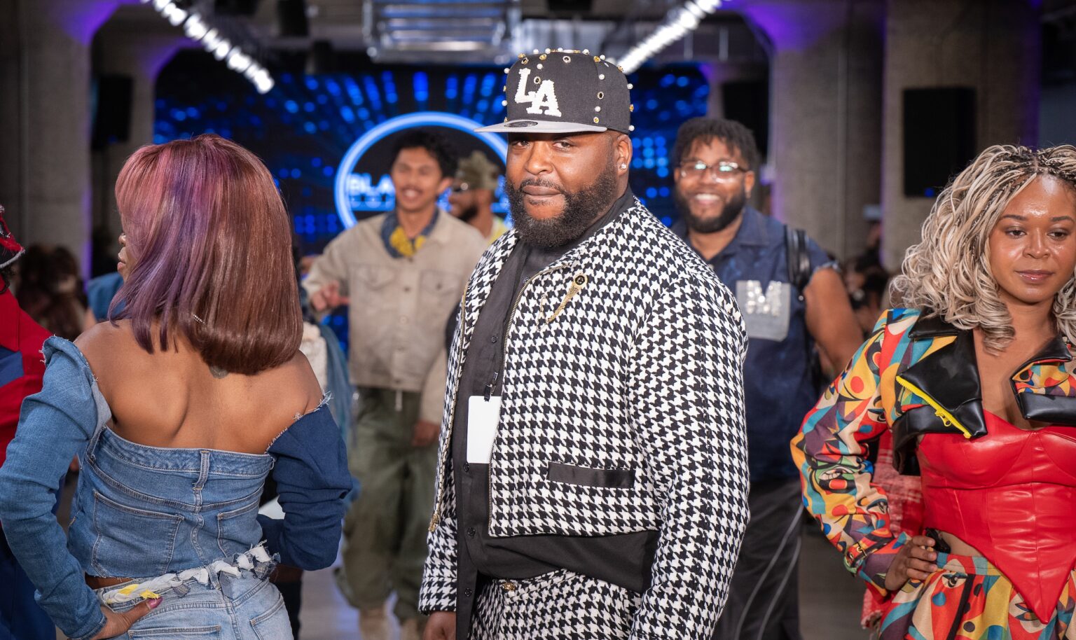 LOS ANGELES, CALIFORNIA - OCTOBER 18: Designer and models walk the runway at the Upcycle Denim & Sustainability Project 2025 show during Los Angeles Fashion Week Powered By Art Hearts Fashion at The New Mart on October 18, 2025 in Los Angeles, California. (Photo by Mark Gunter/Getty Images for Art Hearts Fashion)