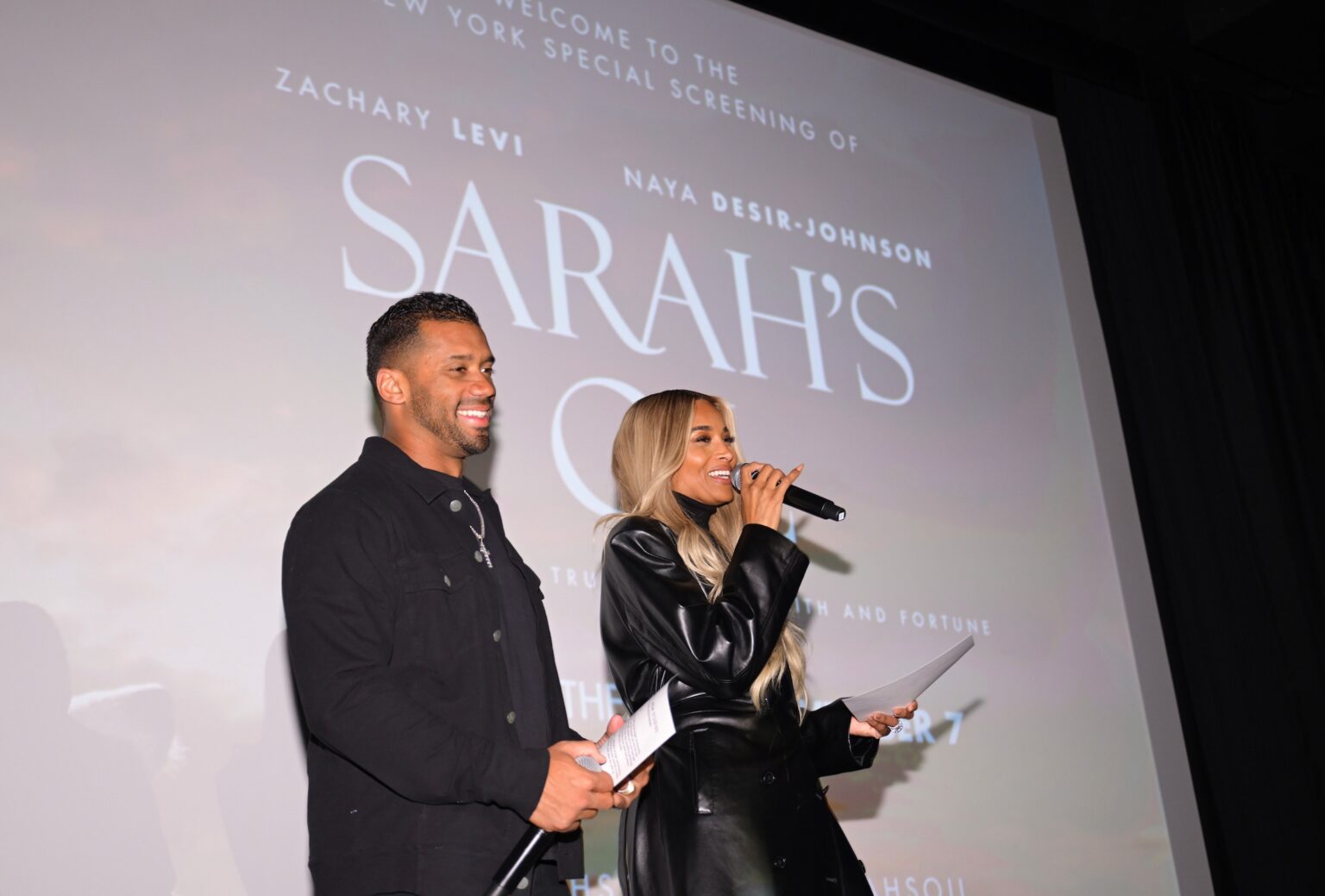 NEW YORK, NEW YORK - NOVEMBER 05: (L-R) Russell Wilson and Ciara introduce film during the NY special screening of Amazon MGM Studios "Sarah's Oil" at The Whitby Hotel on November 05, 2025 in New York City. (Photo by Valerie Terranova/Getty Images for Amazon MGM Studios)