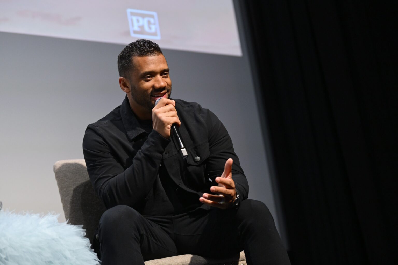 NEW YORK, NEW YORK - NOVEMBER 05: Russell Wilson speaks onstage during the NY special screening of Amazon MGM Studios "Sarah's Oil" at The Whitby Hotel on November 05, 2025 in New York City. (Photo by Valerie Terranova/Getty Images for Amazon MGM Studios)