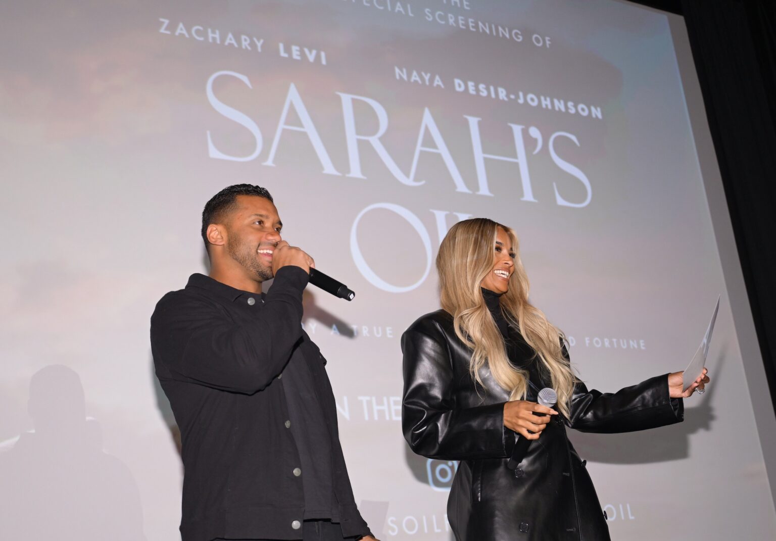NEW YORK, NEW YORK - NOVEMBER 05: (L-R) Russell Wilson and Ciara introduce film during the NY special screening of Amazon MGM Studios "Sarah's Oil" at The Whitby Hotel on November 05, 2025 in New York City. (Photo by Valerie Terranova/Getty Images for Amazon MGM Studios)