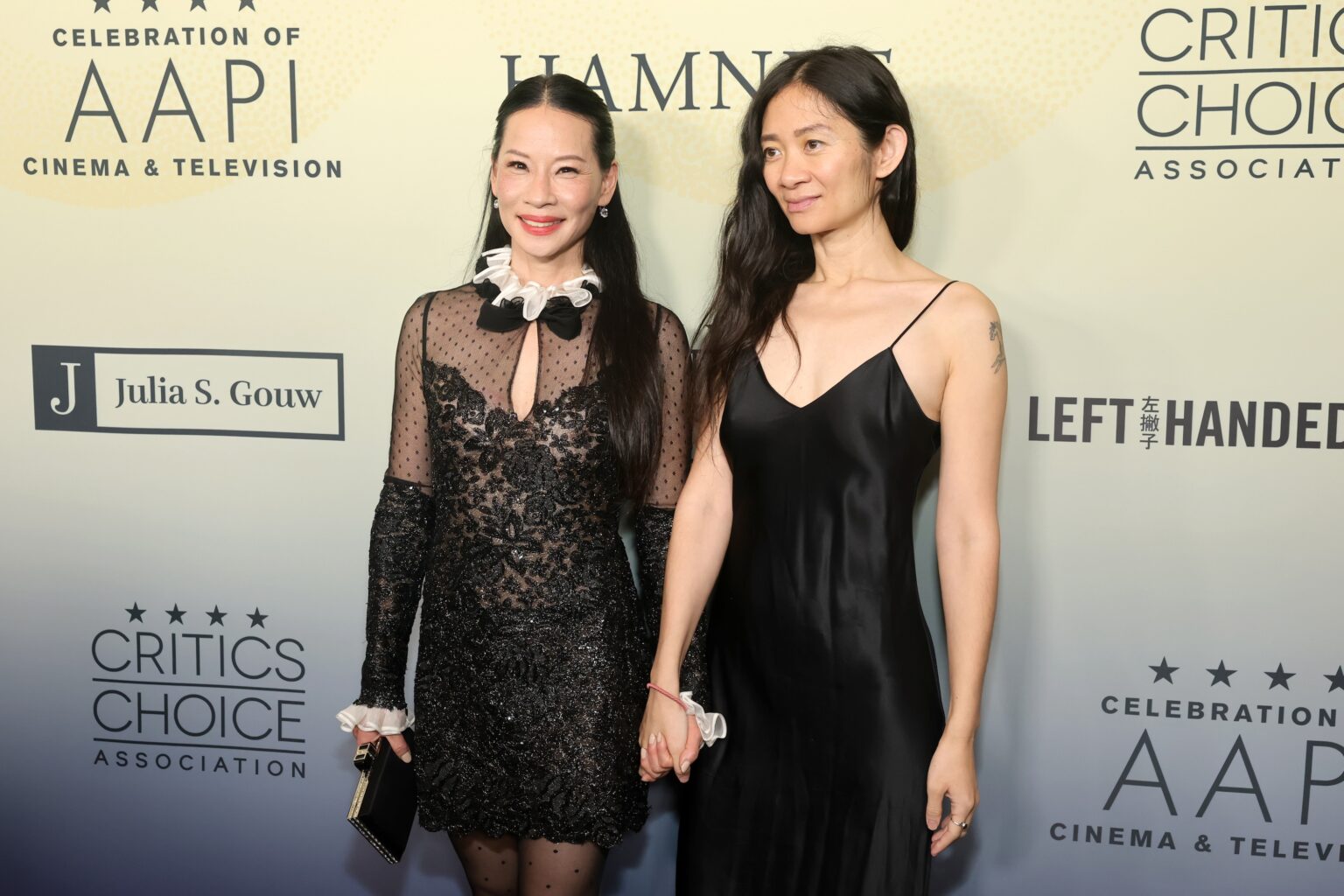 LOS ANGELES, CALIFORNIA - NOVEMBER 14: (L-R) Lucy Liu and Chloé Zhao attend The Critics Choice Association's 4th Annual Celebration of AAPI Cinema & Television at Four Seasons Hotel Los Angeles at Beverly Hills on November 14, 2025 in Los Angeles, California. (Photo by Emma McIntyre/Getty Images for Critics Choice Association)