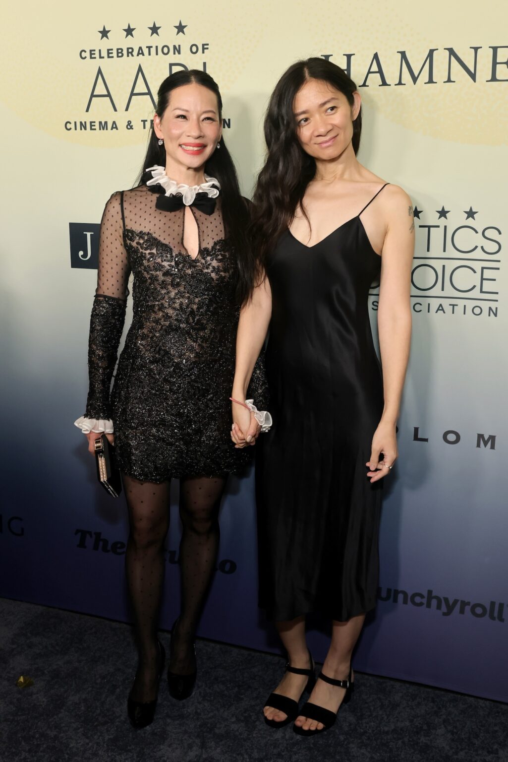 LOS ANGELES, CALIFORNIA - NOVEMBER 14: (L-R) Lucy Liu and Chloé Zhao attend The Critics Choice Association's 4th Annual Celebration of AAPI Cinema & Television at Four Seasons Hotel Los Angeles at Beverly Hills on November 14, 2025 in Los Angeles, California. (Photo by Emma McIntyre/Getty Images for Critics Choice Association)