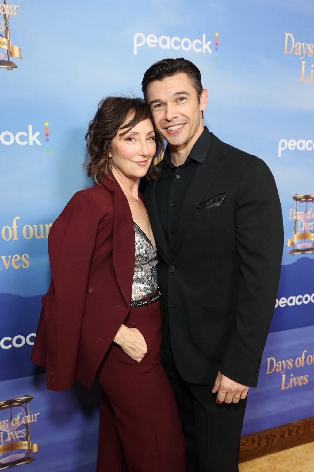 DAYS OF OUR LIVES -- "60th Anniversary Red Carpet" Episode -- Pictured: Carmen Cusack, Paul Telfer -- (Photo by: Todd Williamson/Peacock)