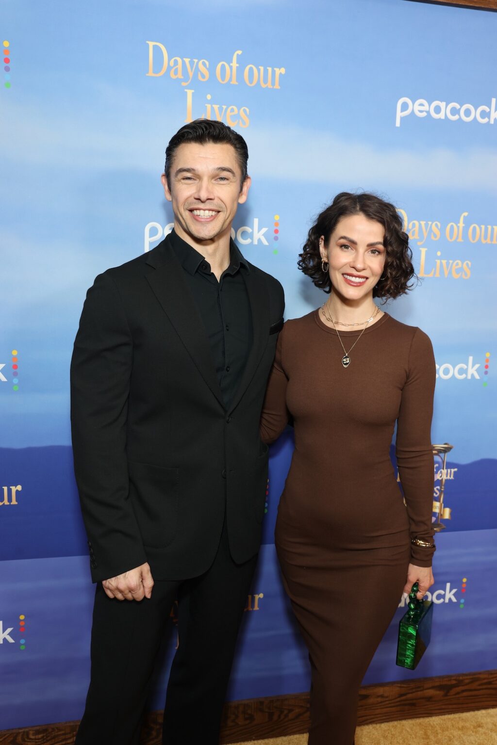 DAYS OF OUR LIVES -- "60th Anniversary Red Carpet" Episode -- Pictured: (l-r) Paul Telfer, Linsey Godfrey -- (Photo by: Todd Williamson/Peacock)
