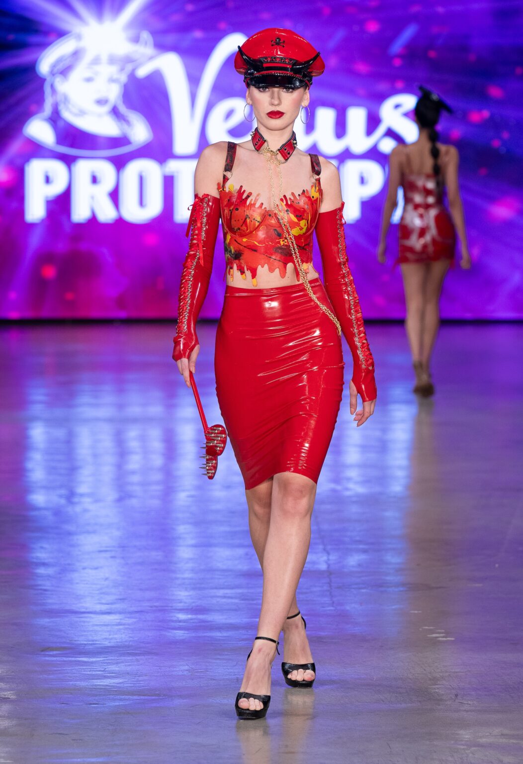LOS ANGELES, CALIFORNIA - OCTOBER 18: A model walks the runway at the Venus Prototype show during Los Angeles Fashion Week Powered By Art Hearts Fashion at The New Mart on October 18, 2025 in Los Angeles, California. (Photo by Mark Gunter/Getty Images for Art Hearts Fashion)
