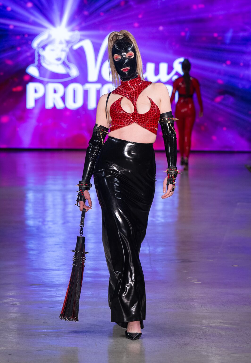 LOS ANGELES, CALIFORNIA - OCTOBER 18: A model walks the runway at the Venus Prototype show during Los Angeles Fashion Week Powered By Art Hearts Fashion at The New Mart on October 18, 2025 in Los Angeles, California. (Photo by Mark Gunter/Getty Images for Art Hearts Fashion)