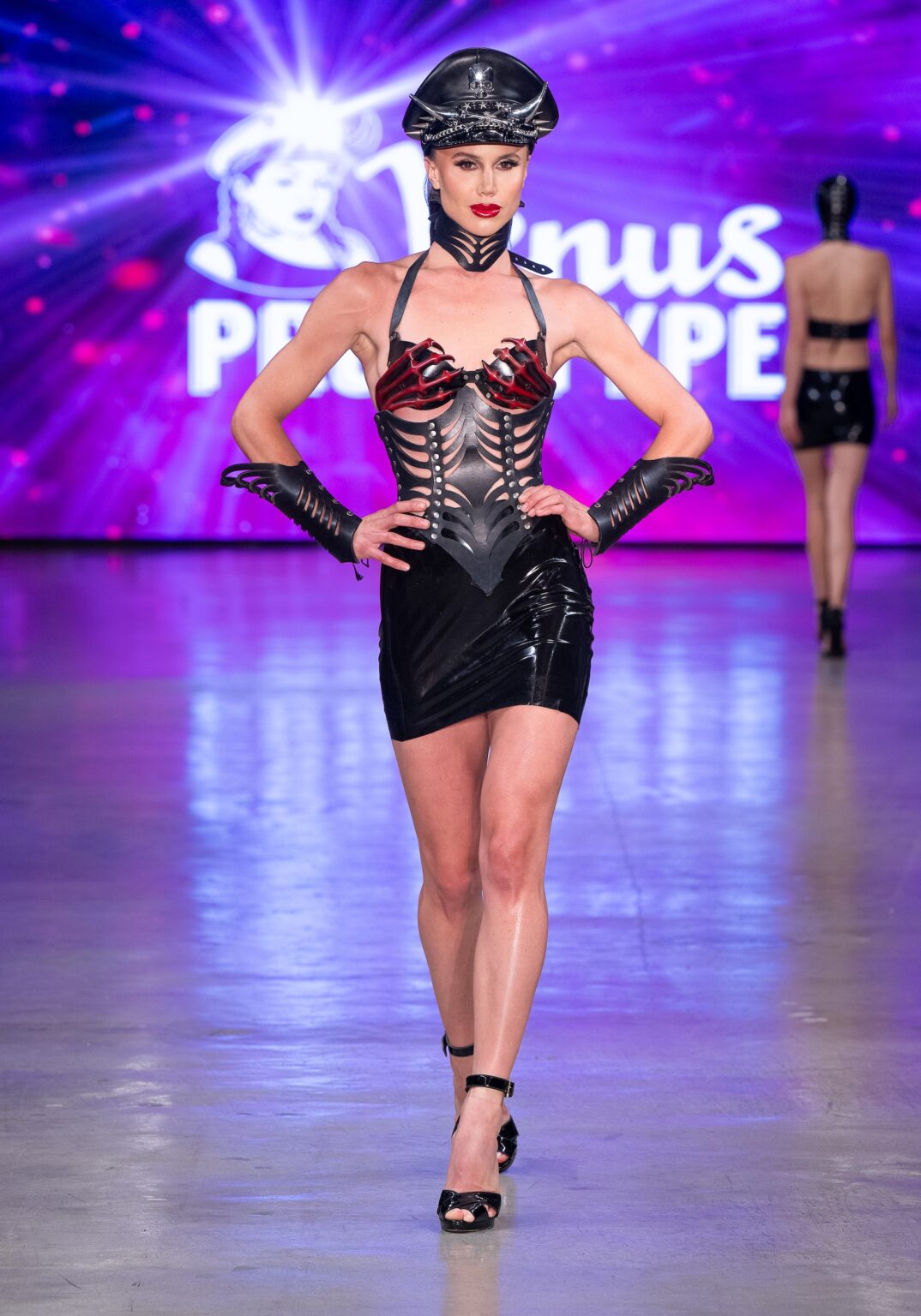 LOS ANGELES, CALIFORNIA - OCTOBER 18: A model walks the runway at the Venus Prototype show during Los Angeles Fashion Week Powered By Art Hearts Fashion at The New Mart on October 18, 2025 in Los Angeles, California. (Photo by Mark Gunter/Getty Images for Art Hearts Fashion)