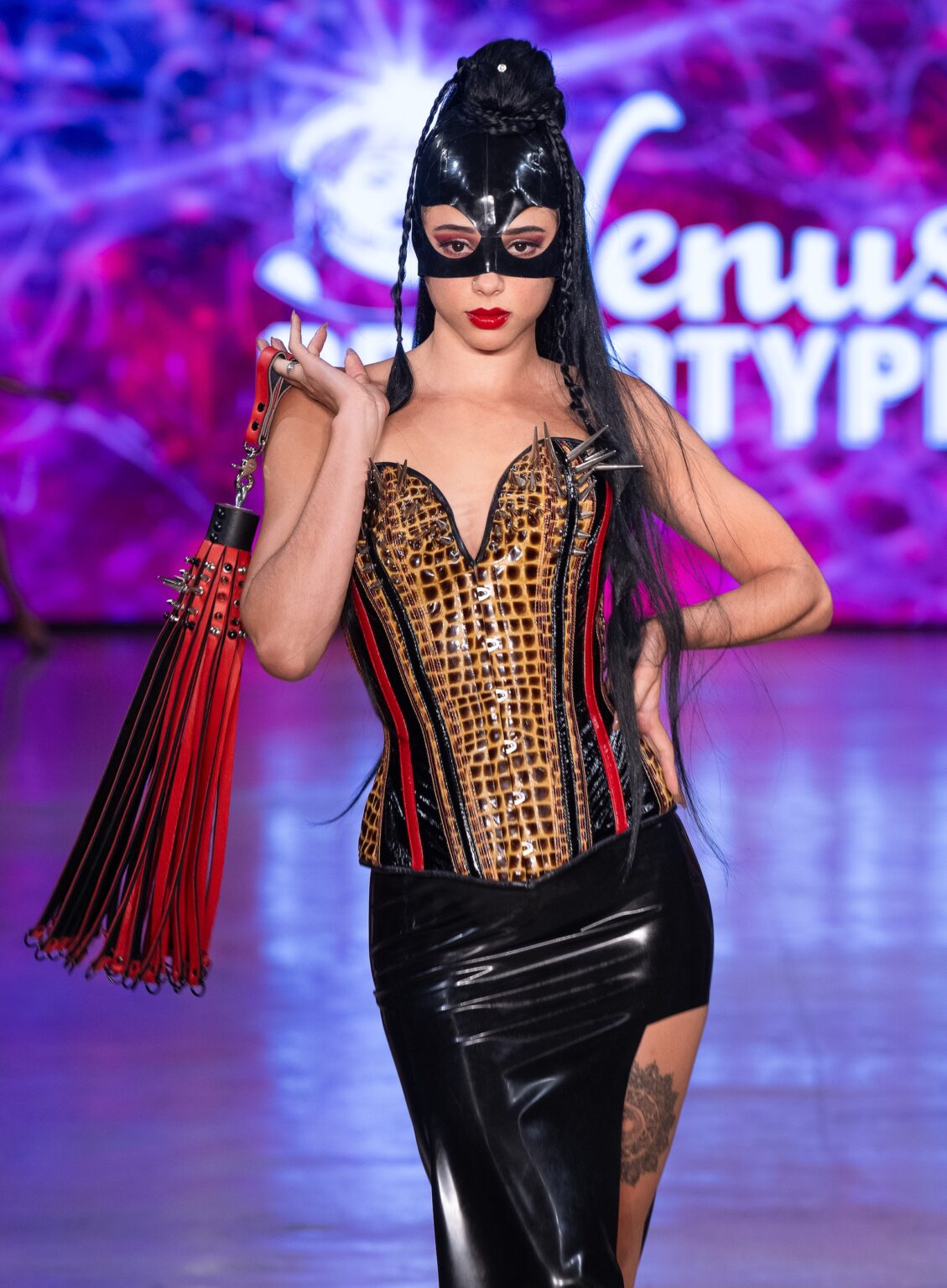 LOS ANGELES, CALIFORNIA - OCTOBER 18: A model walks the runway at the Venus Prototype show during Los Angeles Fashion Week Powered By Art Hearts Fashion at The New Mart on October 18, 2025 in Los Angeles, California. (Photo by Mark Gunter/Getty Images for Art Hearts Fashion)