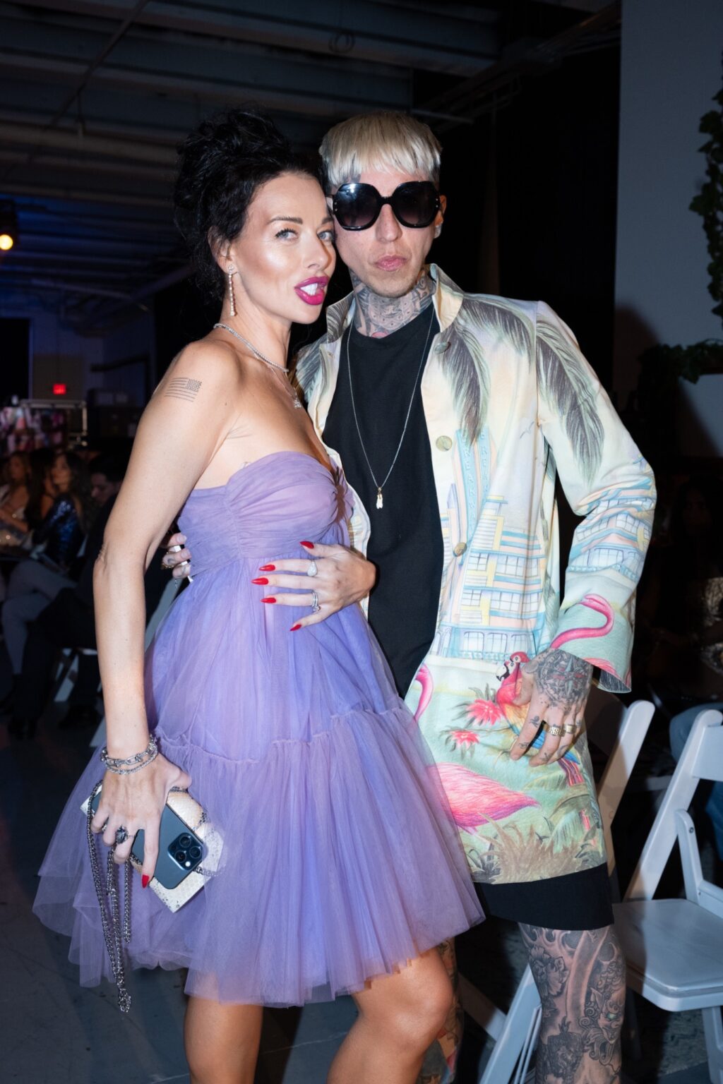 Victoria Unikel and Chris Lavish Pose Front Row at the Art Hearts Fashion Runway