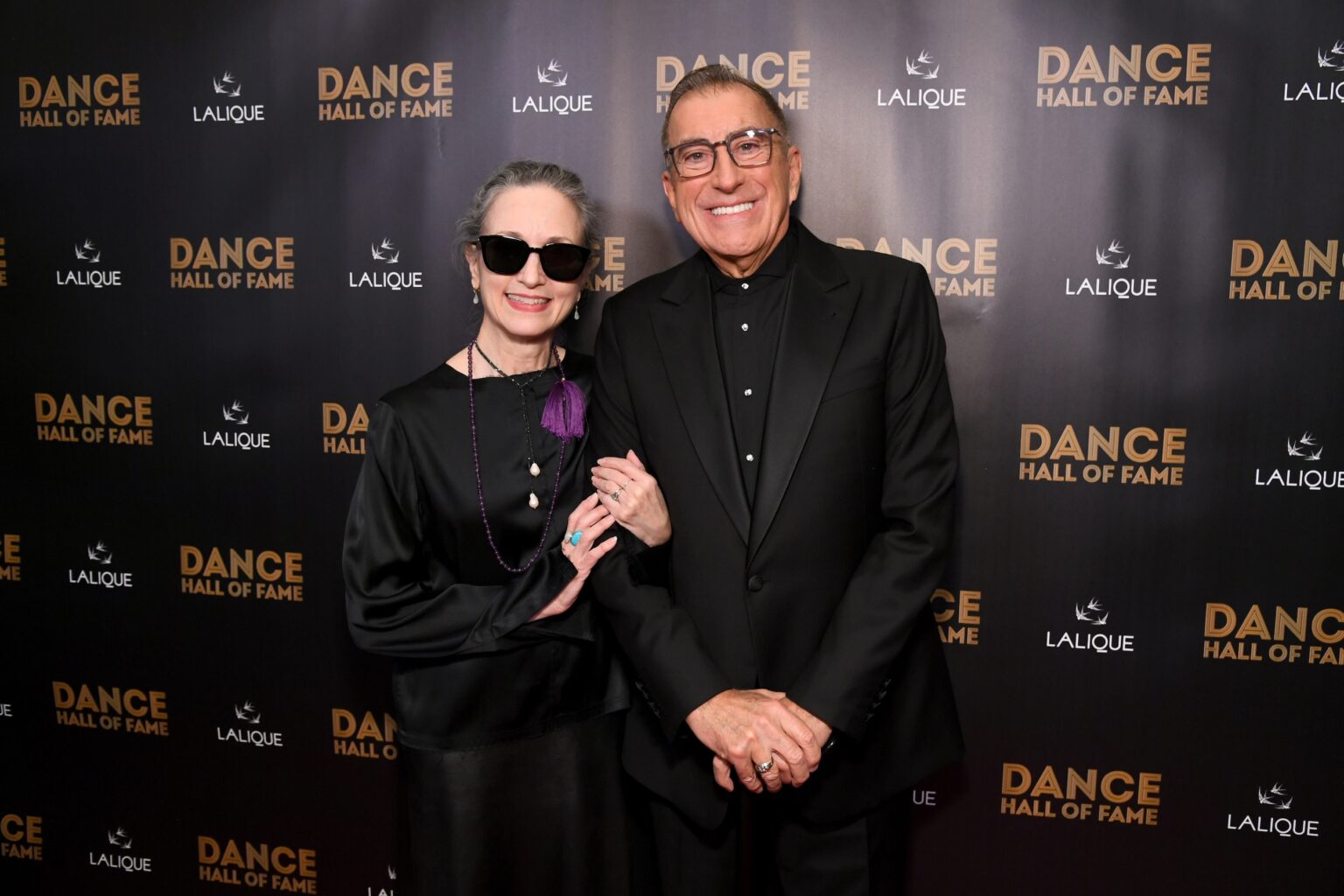 CULVER CITY, CALIFORNIA - DECEMBER 03: (L-R) Bebe Neuwirth and Kenny Ortega attend the inaugural Dance Hall of Fame ceremony honoring the most influential artists in dance history at Glorya Kaufman Community Center on December 03, 2025 in Culver City, California. (Photo by Alberto E. Rodriguez/Getty Images for Dance Hall of Fame)