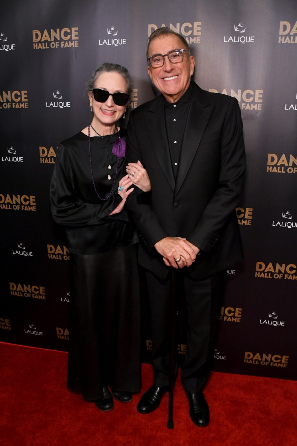 CULVER CITY, CALIFORNIA - DECEMBER 03: (L-R) Bebe Neuwirth and Kenny Ortega attend the inaugural Dance Hall of Fame ceremony honoring the most influential artists in dance history at Glorya Kaufman Community Center on December 03, 2025 in Culver City, California. (Photo by Alberto E. Rodriguez/Getty Images for Dance Hall of Fame)