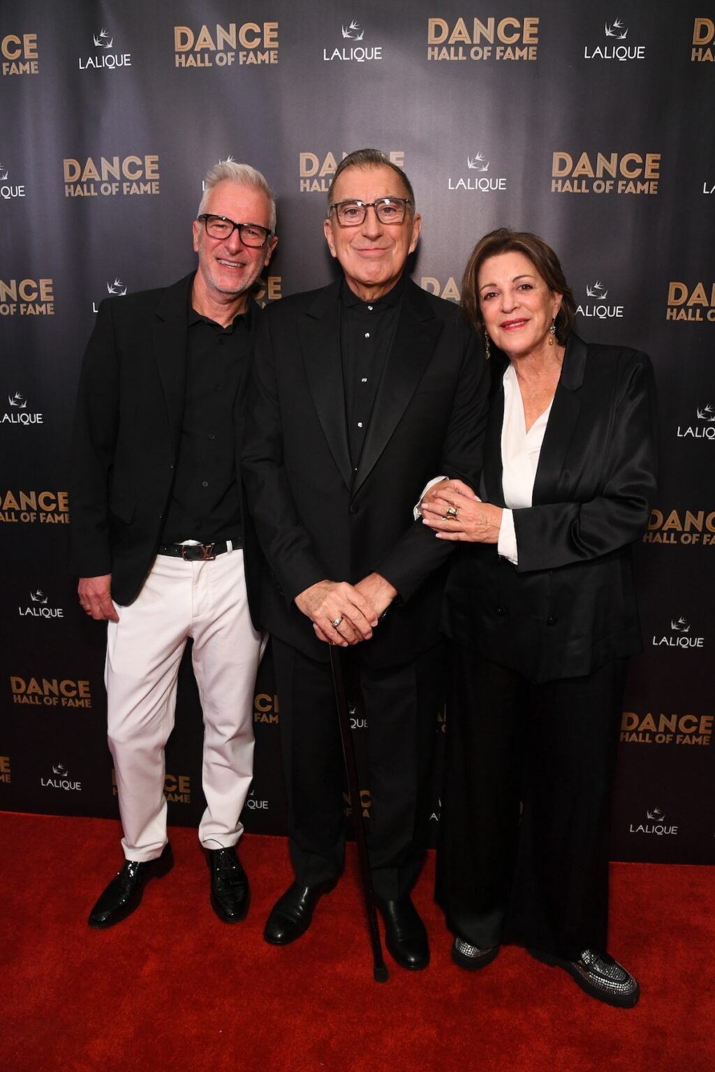 CULVER CITY, CALIFORNIA - DECEMBER 03: (L-R) Tony Selznick, Kenny Ortega, and Julie McDonald attend the inaugural Dance Hall of Fame ceremony honoring the most influential artists in dance history at Glorya Kaufman Community Center on December 03, 2025 in Culver City, California. (Photo by Alberto E. Rodriguez/Getty Images for Dance Hall of Fame)