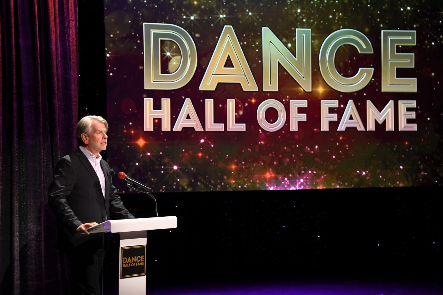 CULVER CITY, CALIFORNIA - DECEMBER 03: Thor Steingraber speaks onstage during the inaugural Dance Hall of Fame ceremony honoring the most influential artists in dance history at Glorya Kaufman Community Center on December 03, 2025 in Culver City, California. (Photo by Alberto E. Rodriguez/Getty Images for Dance Hall of Fame)
