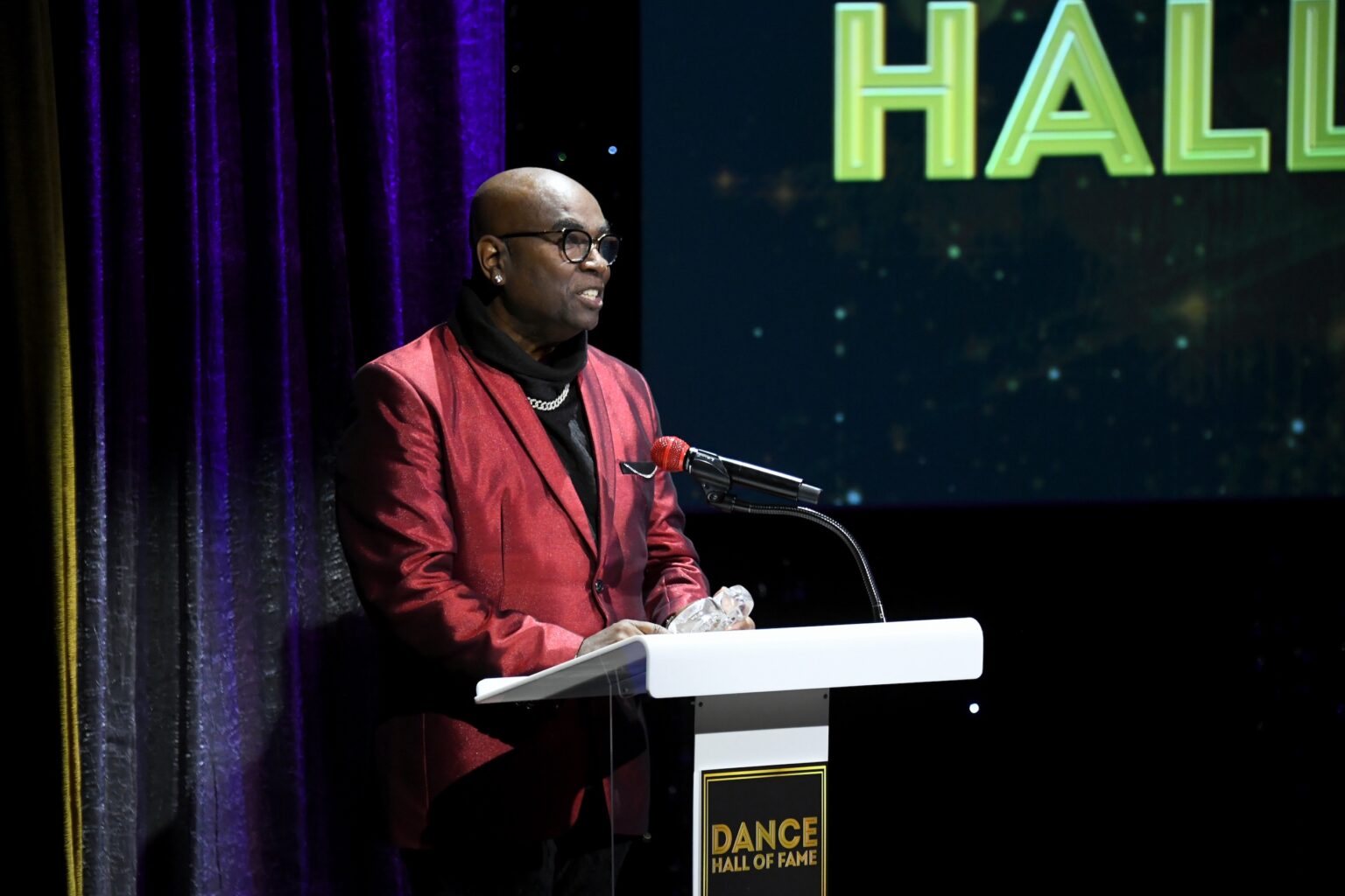 CULVER CITY, CALIFORNIA - DECEMBER 03: Stuart K. Robinson speaks onstage during the inaugural Dance Hall of Fame ceremony honoring the most influential artists in dance history at Glorya Kaufman Community Center on December 03, 2025 in Culver City, California. (Photo by Alberto E. Rodriguez/Getty Images for Dance Hall of Fame)