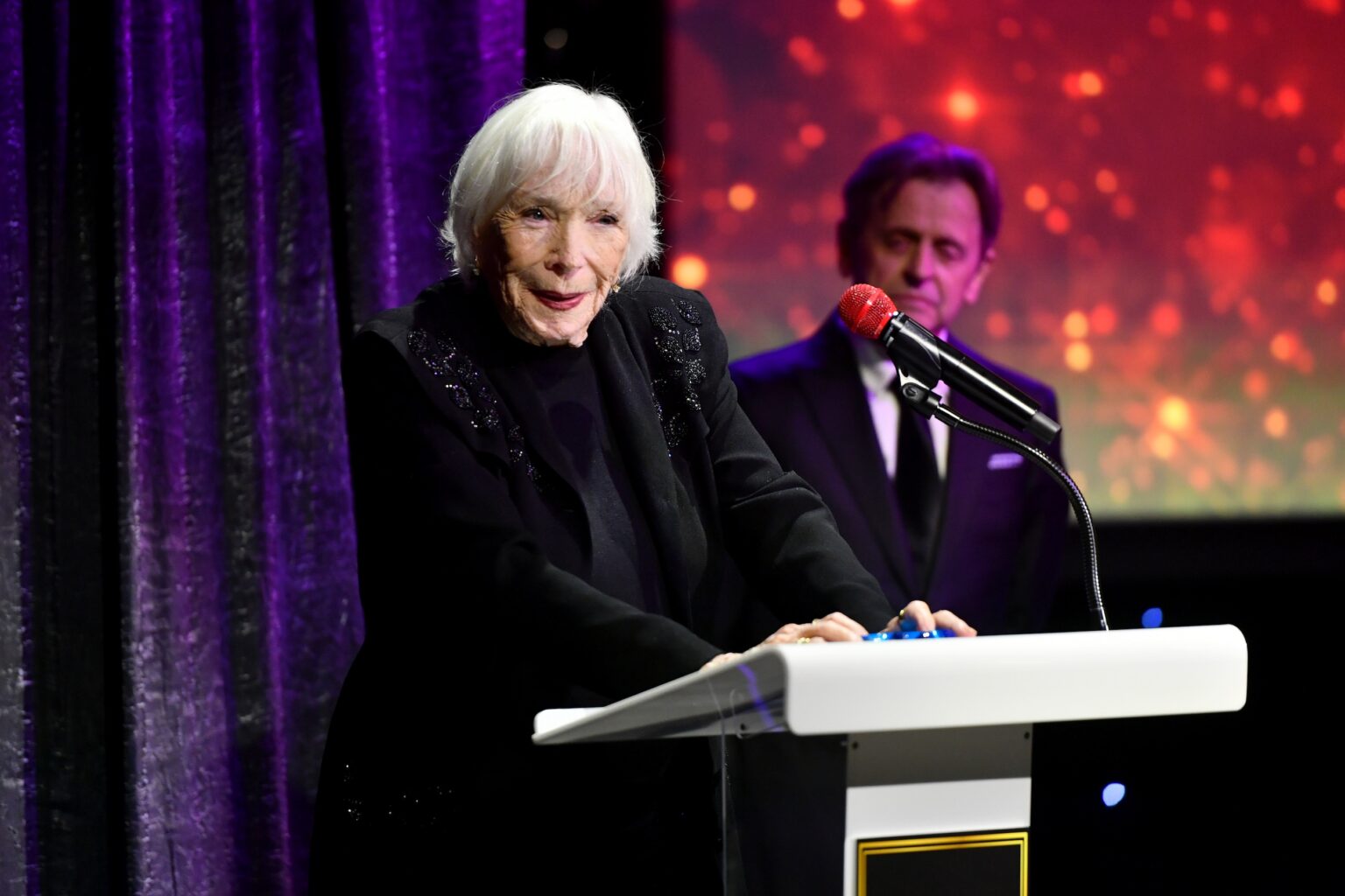 CULVER CITY, CALIFORNIA - DECEMBER 03: Shirley MacLaine accepts the Lifetime Achievement Award onstage during the inaugural Dance Hall of Fame ceremony honoring the most influential artists in dance history at Glorya Kaufman Community Center on December 03, 2025 in Culver City, California. (Photo by Alberto E. Rodriguez/Getty Images for Dance Hall of Fame)