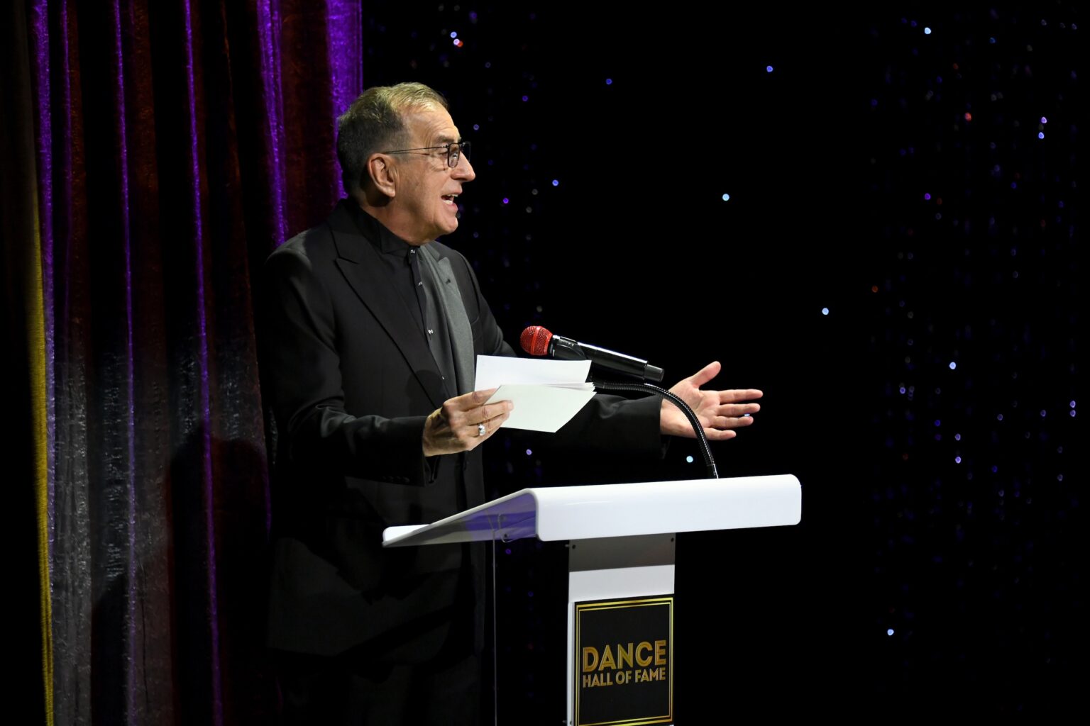 CULVER CITY, CALIFORNIA - DECEMBER 03: Kenny Ortega is inducted into the Dance Hall of Fame onstage during the inaugural Dance Hall of Fame ceremony honoring the most influential artists in dance history at Glorya Kaufman Community Center on December 03, 2025 in Culver City, California. (Photo by Alberto E. Rodriguez/Getty Images for Dance Hall of Fame)