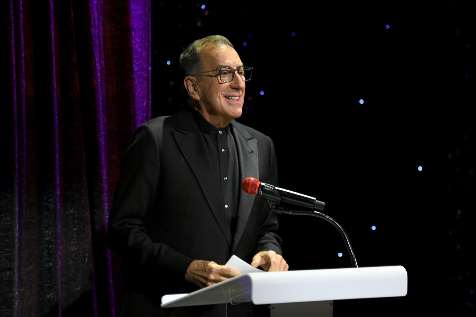 CULVER CITY, CALIFORNIA - DECEMBER 03: Kenny Ortega is inducted into the Dance Hall of Fame onstage during the inaugural Dance Hall of Fame ceremony honoring the most influential artists in dance history at Glorya Kaufman Community Center on December 03, 2025 in Culver City, California. (Photo by Alberto E. Rodriguez/Getty Images for Dance Hall of Fame)