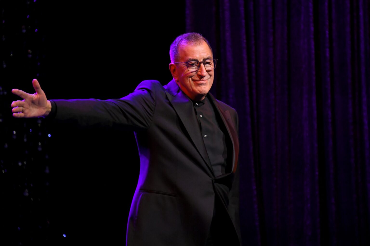 CULVER CITY, CALIFORNIA - DECEMBER 03: Kenny Ortega is inducted into the Dance Hall of Fame onstage during the inaugural Dance Hall of Fame ceremony honoring the most influential artists in dance history at Glorya Kaufman Community Center on December 03, 2025 in Culver City, California. (Photo by Alberto E. Rodriguez/Getty Images for Dance Hall of Fame)