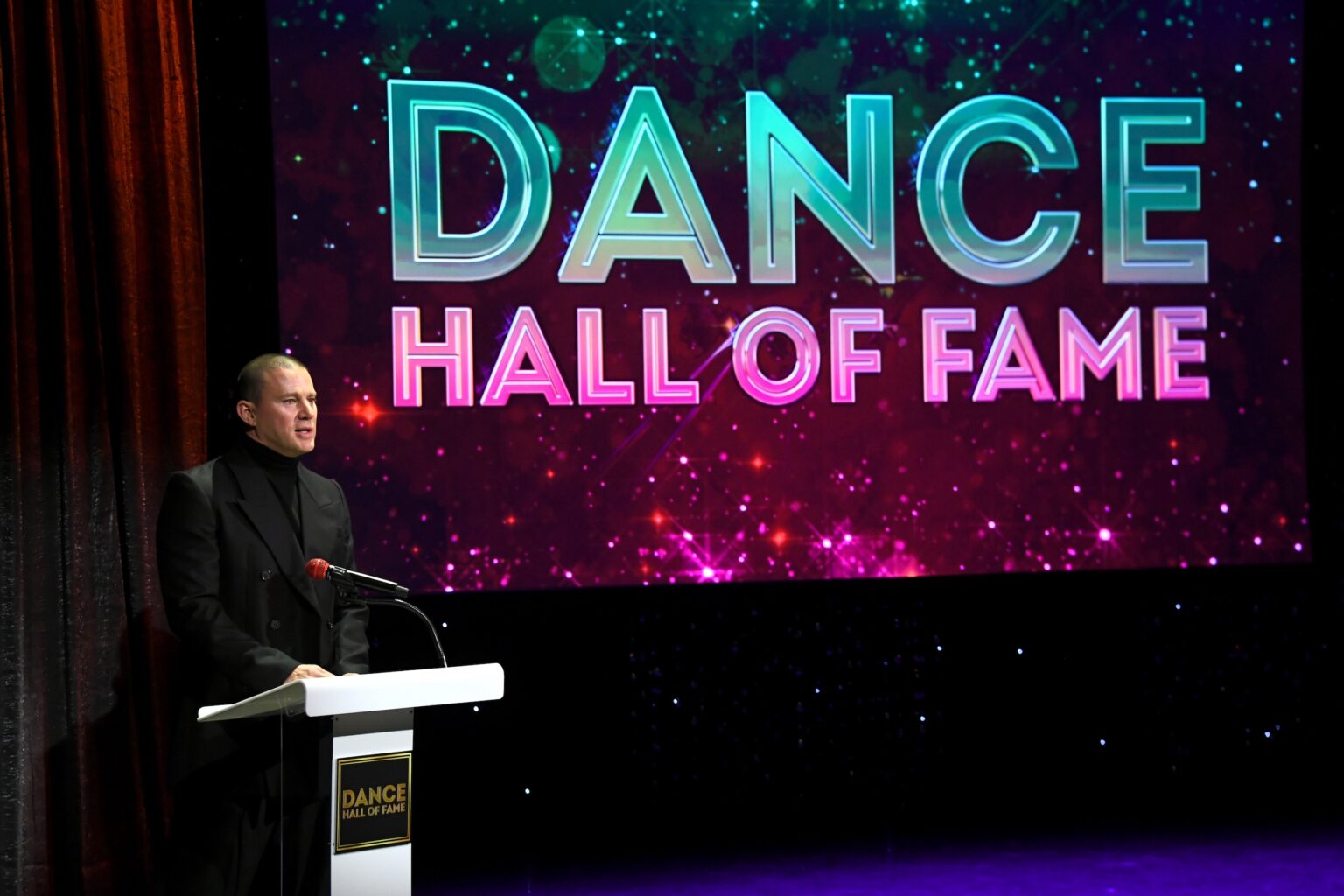 CULVER CITY, CALIFORNIA - DECEMBER 03: Channing Tatum speaks onstage during the inaugural Dance Hall of Fame ceremony honoring the most influential artists in dance history at Glorya Kaufman Community Center on December 03, 2025 in Culver City, California. (Photo by Alberto E. Rodriguez/Getty Images for Dance Hall of Fame)