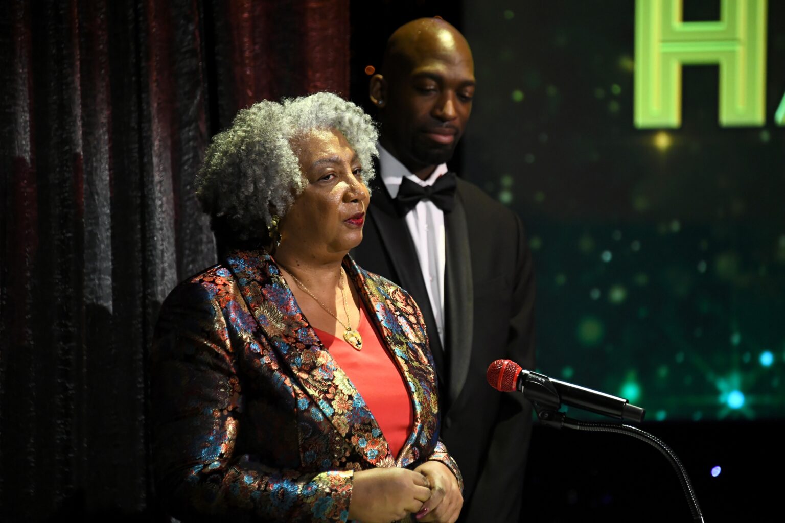 CULVER CITY, CALIFORNIA - DECEMBER 03: (L-R) Connie Boss Alexander and Drè Rose speak onstage during the inaugural Dance Hall of Fame ceremony honoring the most influential artists in dance history at Glorya Kaufman Community Center on December 03, 2025 in Culver City, California. (Photo by Alberto E. Rodriguez/Getty Images for Dance Hall of Fame)