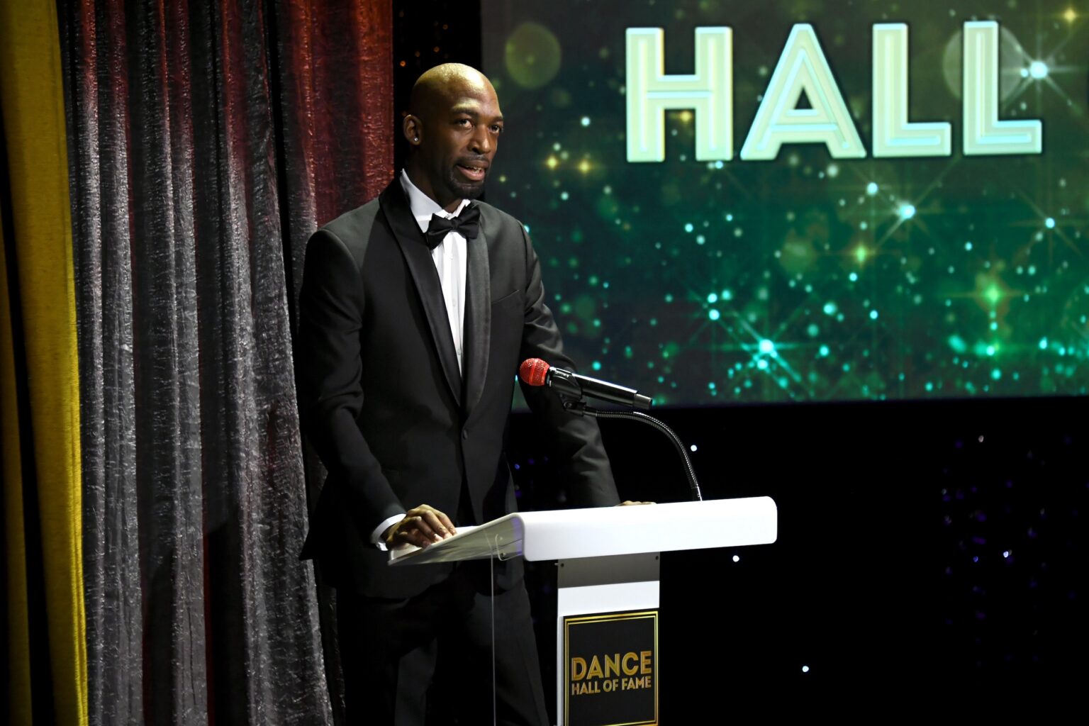 CULVER CITY, CALIFORNIA - DECEMBER 03: Drè Rose speaks onstage during the inaugural Dance Hall of Fame ceremony honoring the most influential artists in dance history at Glorya Kaufman Community Center on December 03, 2025 in Culver City, California. (Photo by Alberto E. Rodriguez/Getty Images for Dance Hall of Fame)