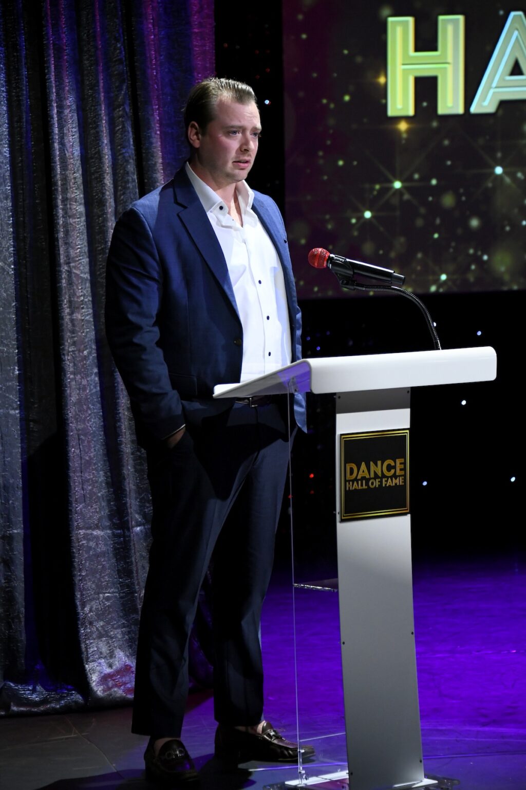 CULVER CITY, CALIFORNIA - DECEMBER 03: Noah Fosse accepts honor on behalf of Bob Fosse onstage during the inaugural Dance Hall of Fame ceremony honoring the most influential artists in dance history at Glorya Kaufman Community Center on December 03, 2025 in Culver City, California. (Photo by Alberto E. Rodriguez/Getty Images for Dance Hall of Fame)