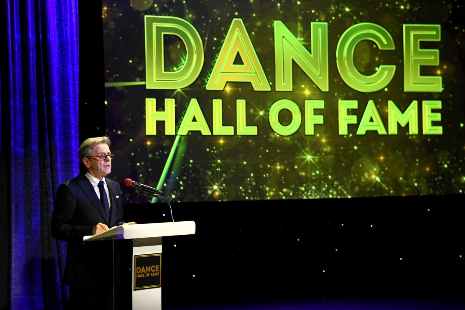 CULVER CITY, CALIFORNIA - DECEMBER 03: Mikhail Baryshnikov is inducted into the Dance Hall of Fame onstage during The Inaugural Dance Hall Of Fame Ceremony Honoring The Most Influential Artists In Dance History at Glorya Kaufman Community Center on December 03, 2025 in Culver City, California. (Photo by Alberto E. Rodriguez/Getty Images for Dance Hall of Fame)