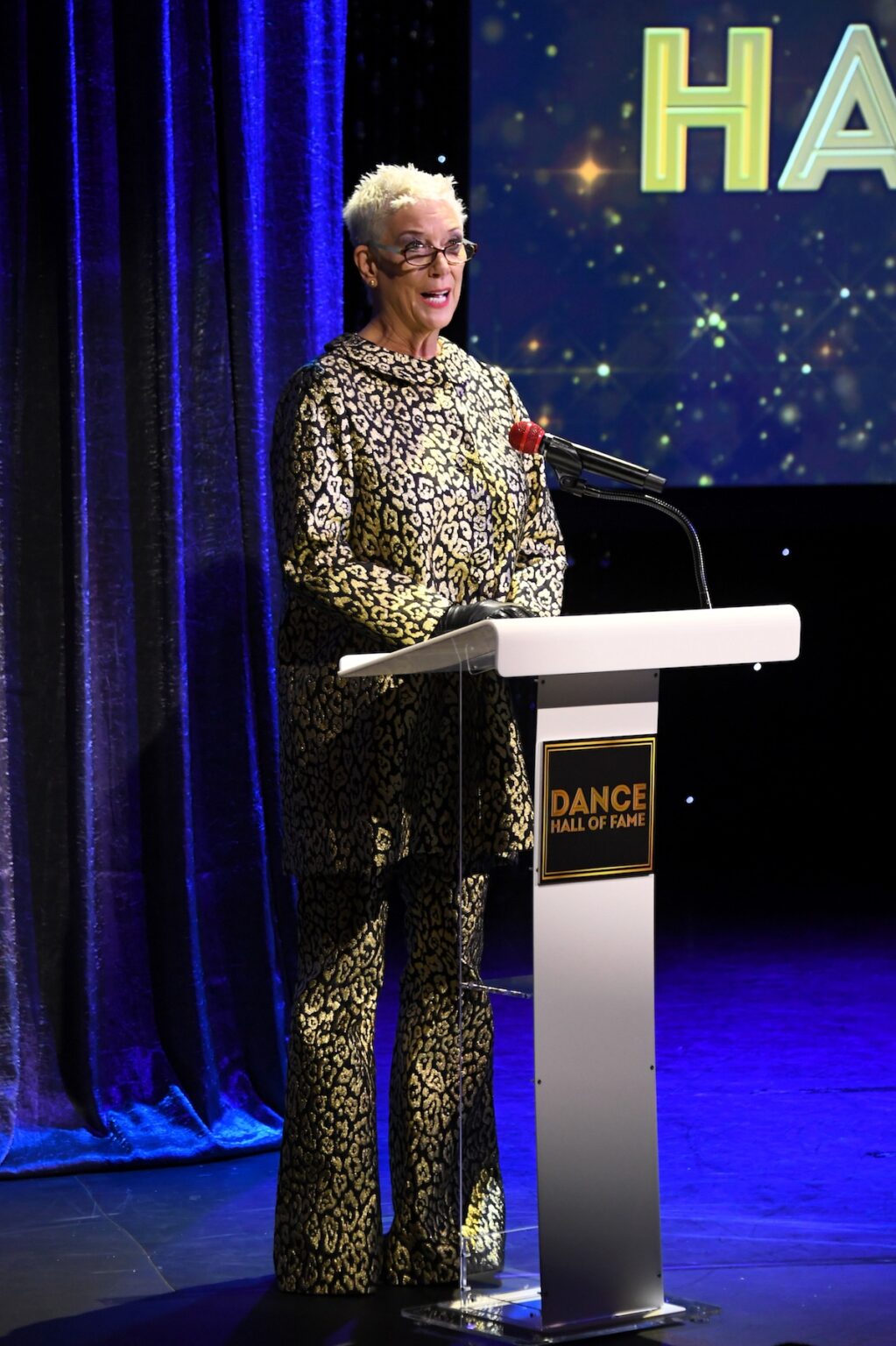 CULVER CITY, CALIFORNIA - DECEMBER 03: Patricia Ward Kelly speaks onstage the inaugural Dance Hall of Fame ceremony honoring the most influential artists in dance history at Glorya Kaufman Community Center on December 03, 2025 in Culver City, California. (Photo by Alberto E. Rodriguez/Getty Images for Dance Hall of Fame)