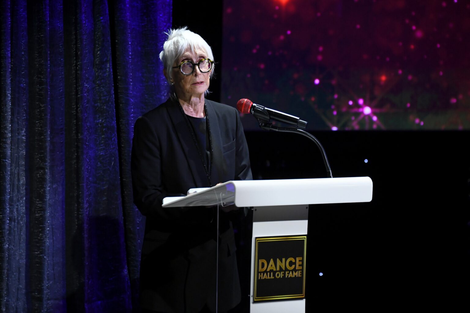 CULVER CITY, CALIFORNIA - DECEMBER 03: Twyla Tharp is inducted into the Dance Hall of Fame onstage during the inaugural Dance Hall of Fame ceremony honoring the most influential artists in dance history at Glorya Kaufman Community Center on December 03, 2025 in Culver City, California. (Photo by Alberto E. Rodriguez/Getty Images for Dance Hall of Fame)