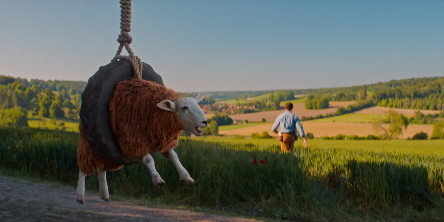 Laraine Newman as the voice of the Fainting Sheep and Hugh Jackman as George Hardy in THE SHEEP DETECTIVES, from Amazon MGM Studios. Photo credit: Courtesy of Amazon MGM Studios © 2026 Amazon Content Services LLC. All Rights Reserved.