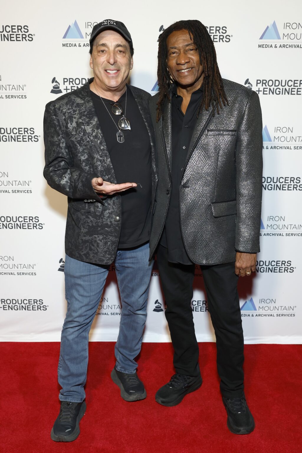LOS ANGELES, CALIFORNIA - JANUARY 28: (L-R) Chris Lord-Alge and Jimmy Douglass attend the Producers & Engineers Wing GRAMMY Week Celebration at The Preserve LA on January 28, 2026 in Los Angeles, California. (Photo by Leon Bennett/Getty Images for The Recording Academy)