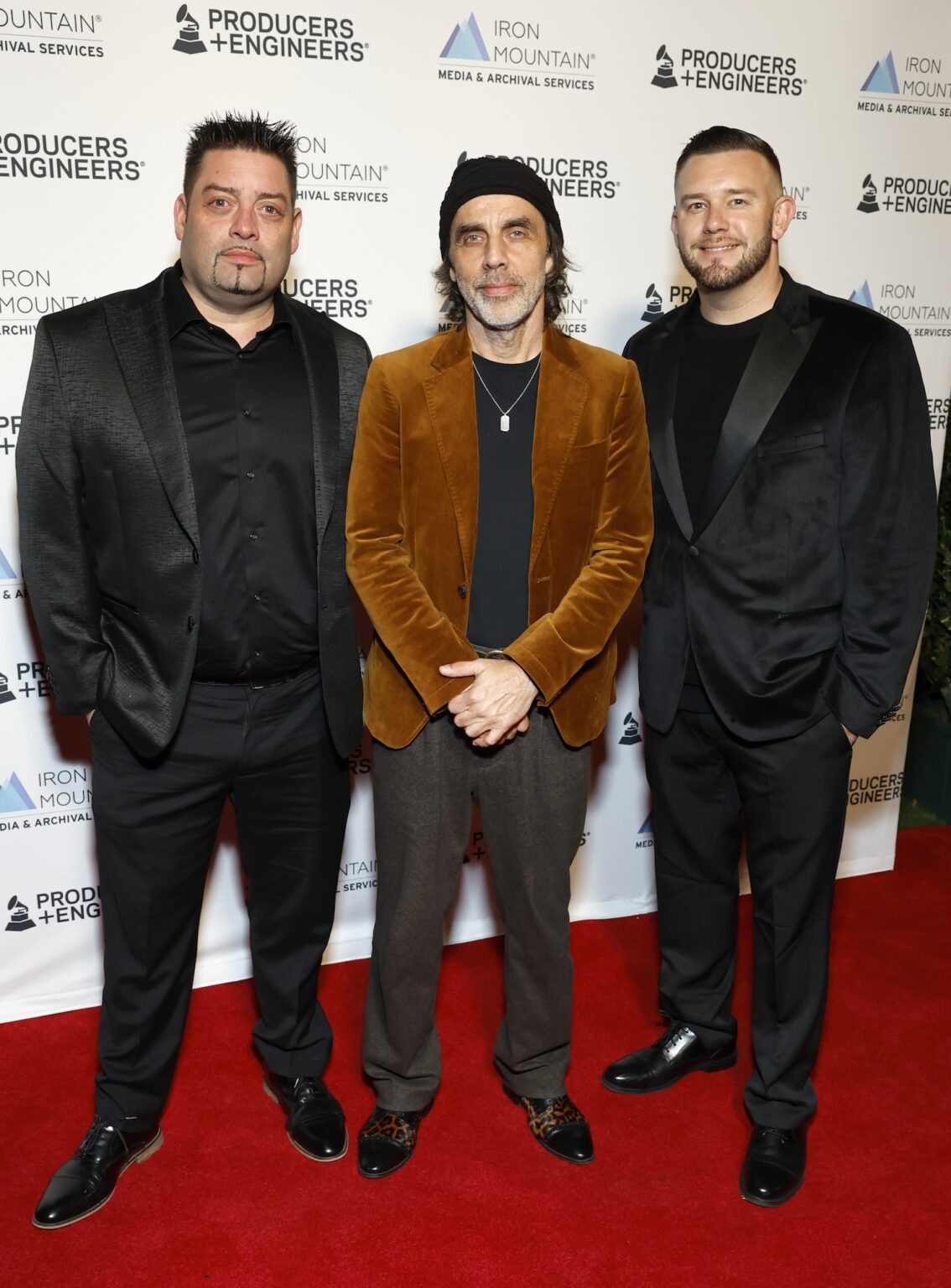 LOS ANGELES, CALIFORNIA - JANUARY 28: (L-R) Barrett Travis, Aben Eubanks, and Eric T. Johnson attend the Producers & Engineers Wing GRAMMY Week Celebration at The Preserve LA on January 28, 2026 in Los Angeles, California. (Photo by Leon Bennett/Getty Images for The Recording Academy)