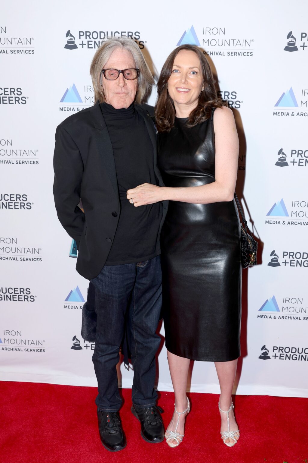 LOS ANGELES, CALIFORNIA - JANUARY 28: (L-R) Jeff Greenberg and Emily DeBow attend the Producers & Engineers Wing GRAMMY Week Celebration at The Preserve LA on January 28, 2026 in Los Angeles, California. (Photo by Maury Phillips/Getty Images for The Recording Academy)