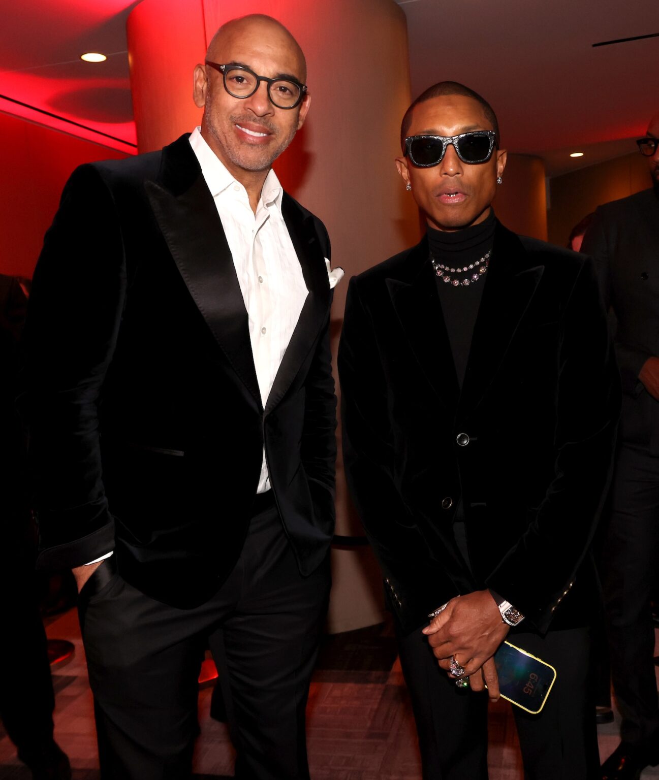 LOS ANGELES, CALIFORNIA - JANUARY 29: (L-R) Harvey Mason jr., CEO, the Recording Academy and Pharrell Williams attend the 2026 Recording Academy Honors presented by The Black Music Collective during the 68th GRAMMY Awards on January 29, 2026 in Los Angeles, California. (Photo by Johnny Nunez/Getty Images for The Recording Academy)