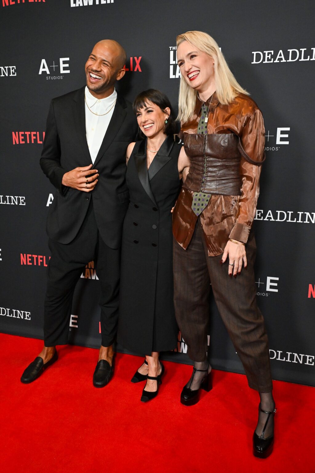 Jeffrey Bowyer-Chapman, Constance Zimmer and Breeda Wool at the Deadline x "The Lincoln Lawyer" Season 4 Premiere Celebration at PMC Rooftop Terrace on January 28, 2026 in Los Angeles, California. Earl Gibsnn III